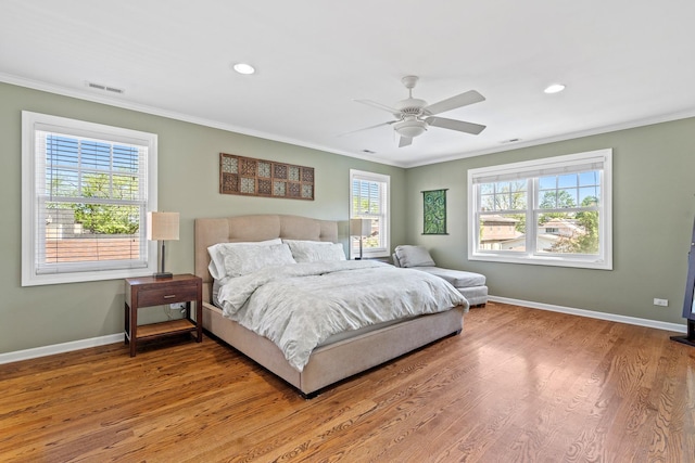 7317 W Greenleaf St, Chicago, IL 60631 - bedroom featuring crown molding, baseboards, wood finished floors, recessed lighting, and ceiling fan