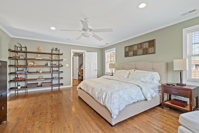 7317 W Greenleaf St, Chicago, IL 60631 - bedroom featuring wood finished floors, crown molding, recessed lighting, baseboards, and a ceiling fan