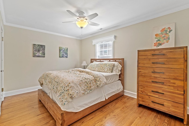 7317 W Greenleaf St, Chicago, IL 60631 - bedroom with ornamental molding, baseboards, light wood-type flooring, and a ceiling fan