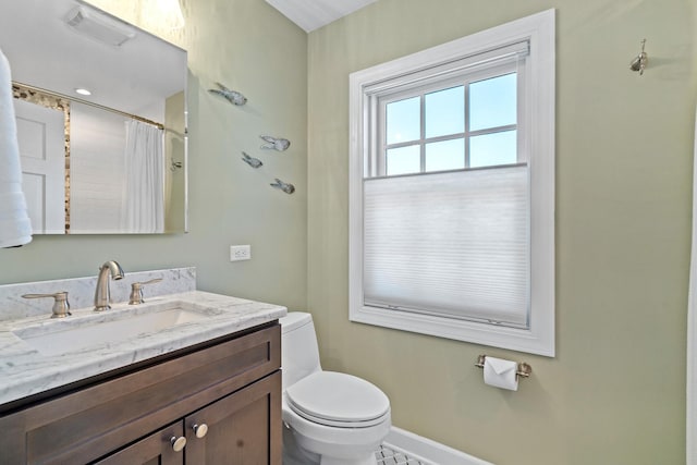 7317 W Greenleaf St, Chicago, IL 60631 - full bathroom with toilet, baseboards, vanity, and curtained shower