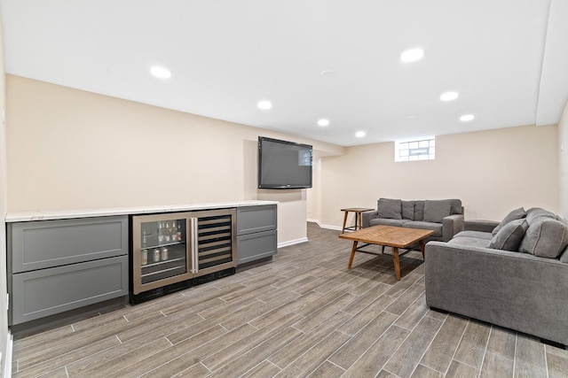 7317 W Greenleaf St, Chicago, IL 60631 - living room featuring wine cooler, light wood-style flooring, a dry bar, baseboards, and recessed lighting