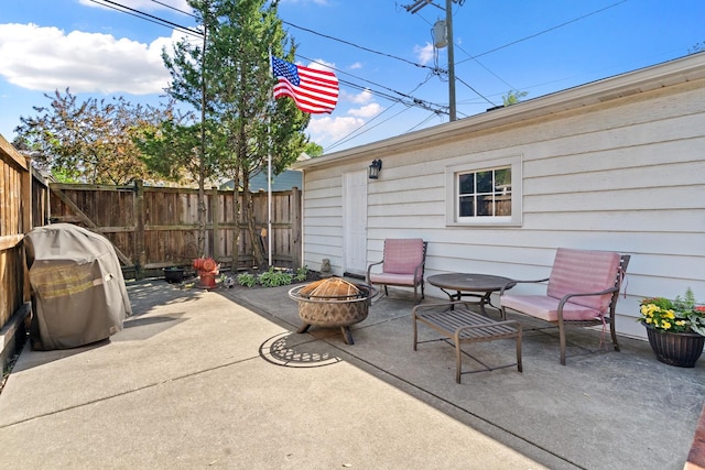 7317 W Greenleaf St, Chicago, IL 60631 - view of patio featuring a fire pit