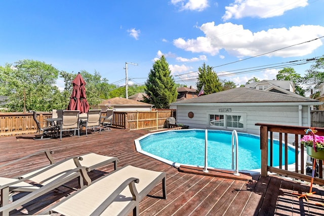 7317 W Greenleaf St, Chicago, IL 60631 - view of swimming pool with a wooden deck and outdoor dining area
