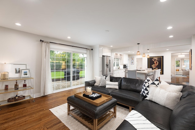 2S151 Stratford Rd, Glen Ellyn, IL 60137 - living room featuring recessed lighting, wood finished floors, and baseboards