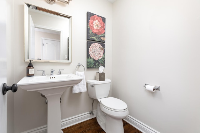 2S151 Stratford Rd, Glen Ellyn, IL 60137 - bathroom featuring baseboards, toilet, and wood finished floors