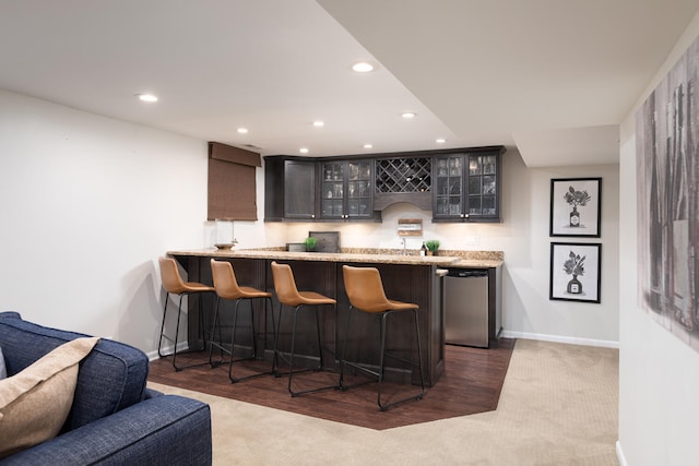 2S151 Stratford Rd, Glen Ellyn, IL 60137 - indoor wet bar featuring stainless steel dishwasher, recessed lighting, baseboards, carpet floors, and wood finished floors