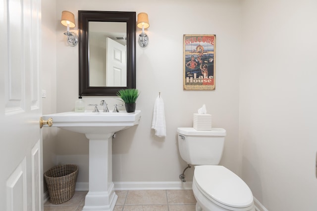 2S151 Stratford Rd, Glen Ellyn, IL 60137 - bathroom featuring toilet, tile patterned floors, and baseboards
