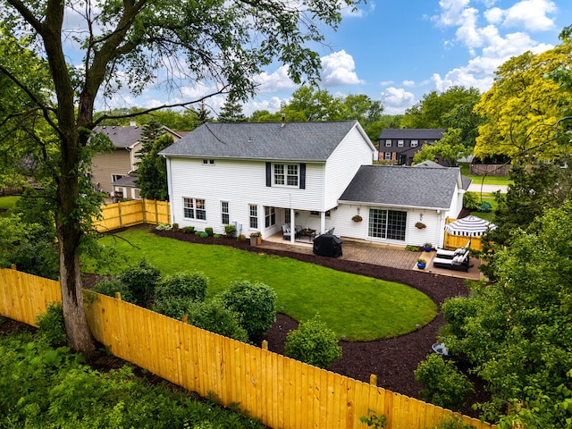 2S151 Stratford Rd, Glen Ellyn, IL 60137 - back of house with a patio area and a shingled roof