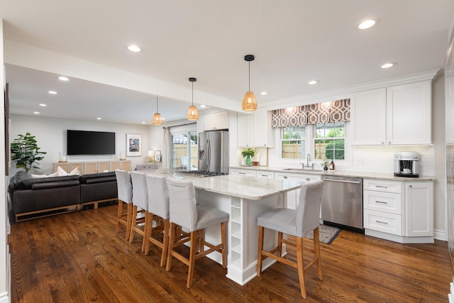 2S151 Stratford Rd, Glen Ellyn, IL 60137 - kitchen with stainless steel appliances, a sink, white cabinets, dark wood-style floors, and recessed lighting
