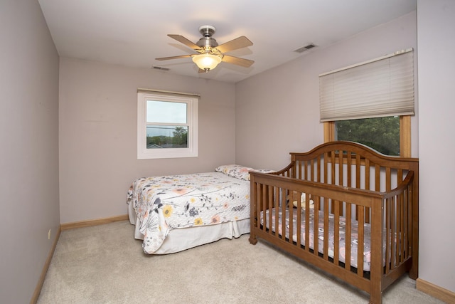 5148 S Newland Ave, Chicago, IL 60638 - bedroom with carpet floors, baseboards, and ceiling fan