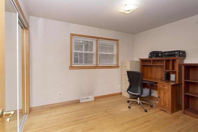 5148 S Newland Ave, Chicago, IL 60638 - office with light wood-type flooring and baseboards