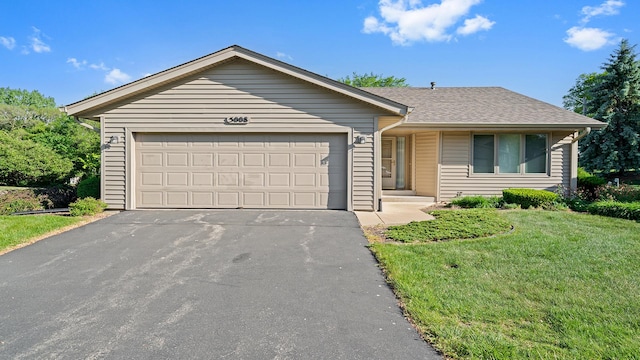 5008 Thistle Trl, Loves Park, IL 61111 - single story home with driveway, a garage, a front yard, and roof with shingles