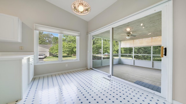 5008 Thistle Trl, Loves Park, IL 61111 - unfurnished sunroom featuring vaulted ceiling and ceiling fan