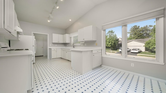 5008 Thistle Trl, Loves Park, IL 61111 - kitchen featuring a sink, light countertops, healthy amount of natural light, and lofted ceiling