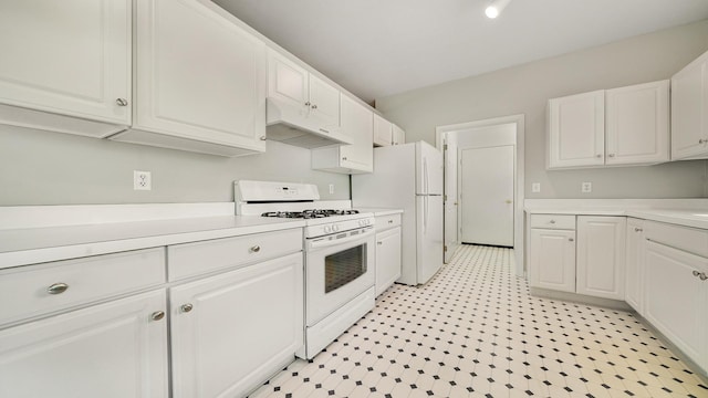 5008 Thistle Trl, Loves Park, IL 61111 - kitchen featuring white appliances, under cabinet range hood, light countertops, and white cabinetry