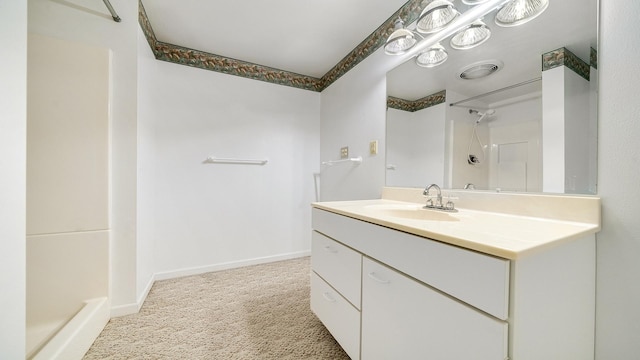 5008 Thistle Trl, Loves Park, IL 61111 - bathroom with a shower, vanity, and baseboards