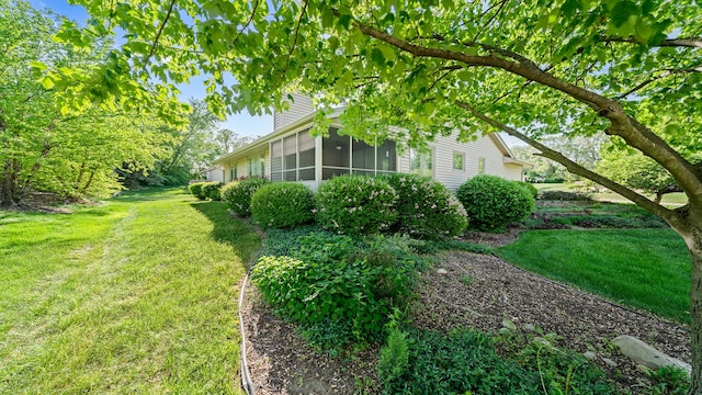 5008 Thistle Trl, Loves Park, IL 61111 - view of grassy yard with a sunroom