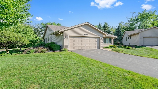 5008 Thistle Trl, Loves Park, IL 61111 - single story home featuring an attached garage, driveway, and a front yard