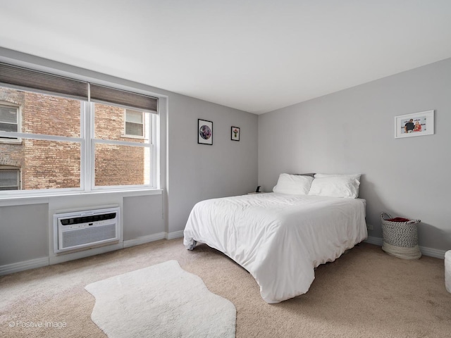 2300 N Commonwealth Ave Unit 2L, Chicago, IL 60614 - bedroom featuring carpet floors, baseboards, and a wall unit AC