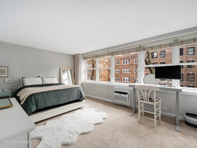 2300 N Commonwealth Ave Unit 2L, Chicago, IL 60614 - bedroom featuring carpet, an office area, a wall unit AC, and baseboards