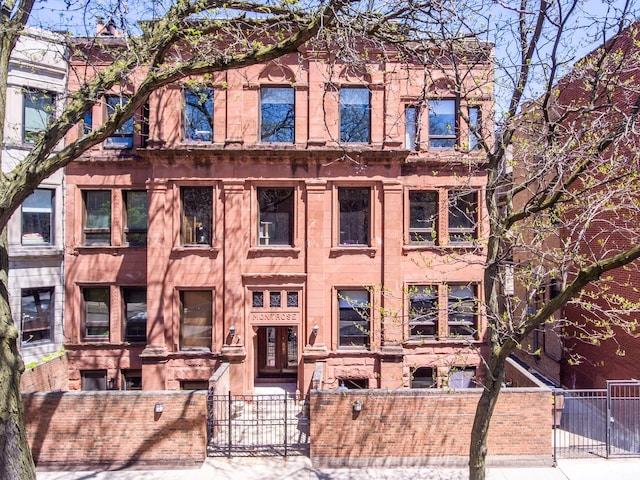 3711 N Pine Grove Ave Unit 2Nw, Chicago, IL 60613 - view of apartment building / complex with a fenced front yard