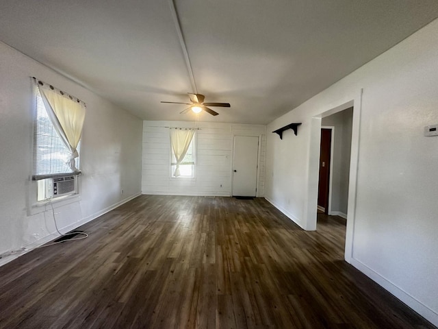 509 E Webster St, Clinton, IL 61727 - unfurnished room featuring cooling unit, ceiling fan, and dark wood finished floors