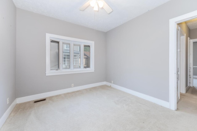 217 W Moulton St, Pontiac, IL 61764 - unfurnished room featuring carpet floors and ceiling fan