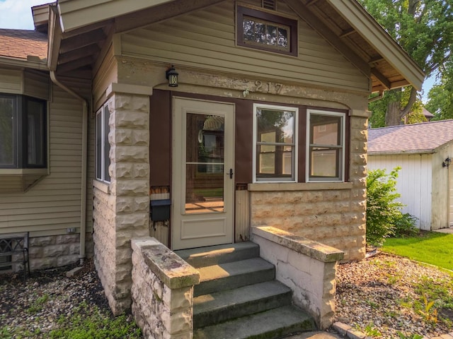 217 W Moulton St, Pontiac, IL 61764 - property entrance with a shingled roof