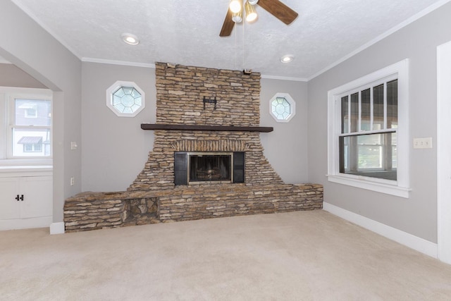 217 W Moulton St, Pontiac, IL 61764 - unfurnished living room with carpet, a ceiling fan, arched walkways, ornamental molding, and a textured ceiling