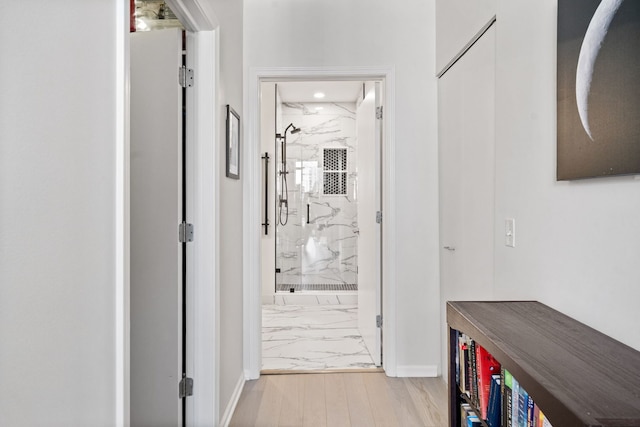 600 N Dearborn St Unit 2005, Chicago, IL 60654 - hallway featuring light marble finish floors and baseboards