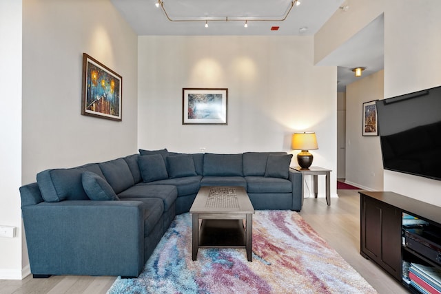 600 N Dearborn St Unit 2005, Chicago, IL 60654 - living room with track lighting and light wood-style floors