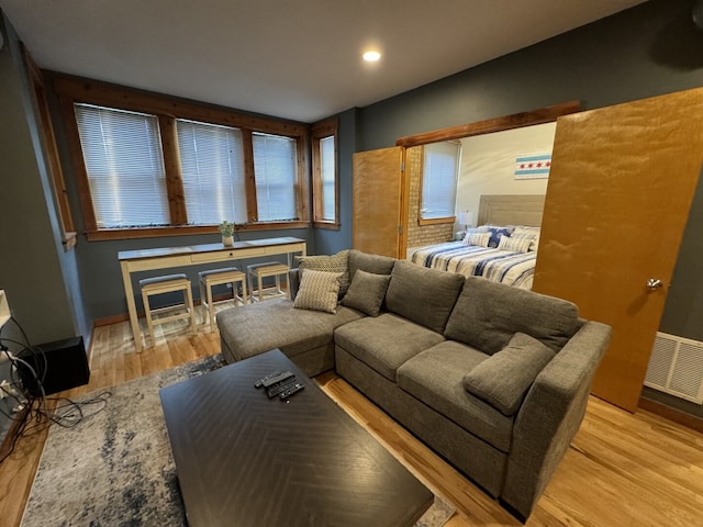 4104 N Mozart St Unit Ge, Chicago, IL 60618 - living area featuring wood finished floors, recessed lighting, and baseboards
