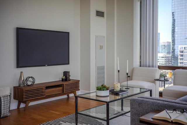 233 E 13th St Unit 2001, Chicago, IL 60605 - living room featuring wood finished floors and baseboards