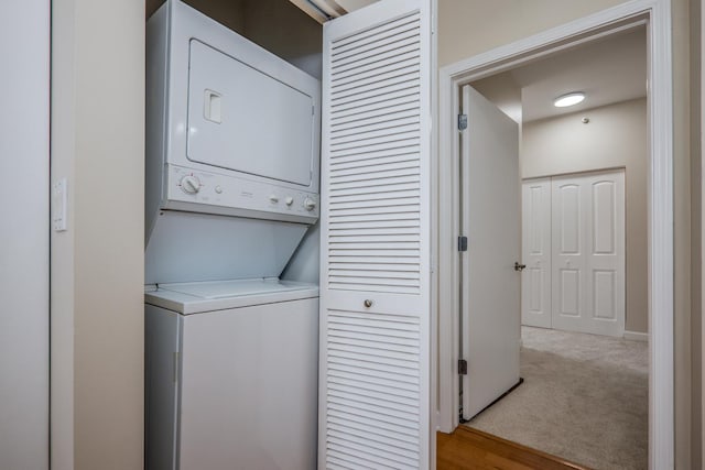 233 E 13th St Unit 2001, Chicago, IL 60605 - laundry room with stacked washer and clothes dryer and carpet flooring