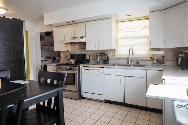 347 Manitowac St, Park Forest, IL 60466 - kitchen with appliances with stainless steel finishes, a sink, light countertops, under cabinet range hood, and decorative backsplash
