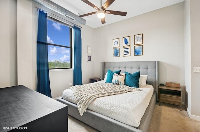 4011 N Francisco Ave Unit 301, Chicago, IL 60618 - bedroom with light carpet, baseboards, and ceiling fan