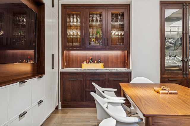 209 E Lake Shore Dr Unit 3W, Chicago, IL 60611 - bar with light wood finished floors