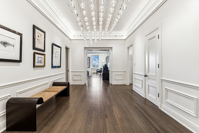 209 E Lake Shore Dr Unit 3W, Chicago, IL 60611 - corridor featuring crown molding, a decorative wall, dark wood finished floors, and a wainscoted wall