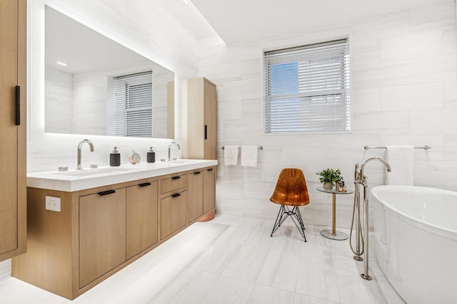 209 E Lake Shore Dr Unit 3W, Chicago, IL 60611 - full bathroom with tile walls, a freestanding tub, and double vanity