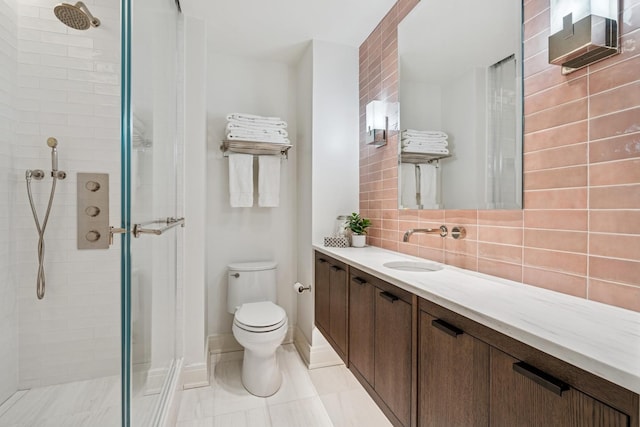 209 E Lake Shore Dr Unit 3W, Chicago, IL 60611 - full bathroom with a shower stall, vanity, toilet, backsplash, and tile patterned floors