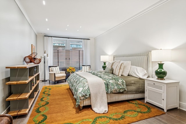 209 E Lake Shore Dr Unit 3W, Chicago, IL 60611 - bedroom with ornamental molding, wood finished floors, and baseboards