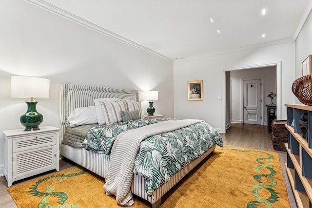 209 E Lake Shore Dr Unit 3W, Chicago, IL 60611 - bedroom with crown molding, wood finished floors, and baseboards