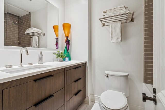 209 E Lake Shore Dr Unit 3W, Chicago, IL 60611 - full bath with vanity, toilet, and baseboards