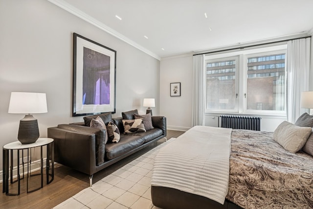 209 E Lake Shore Dr Unit 3W, Chicago, IL 60611 - bedroom featuring radiator heating unit, light wood-type flooring, ornamental molding, and baseboards
