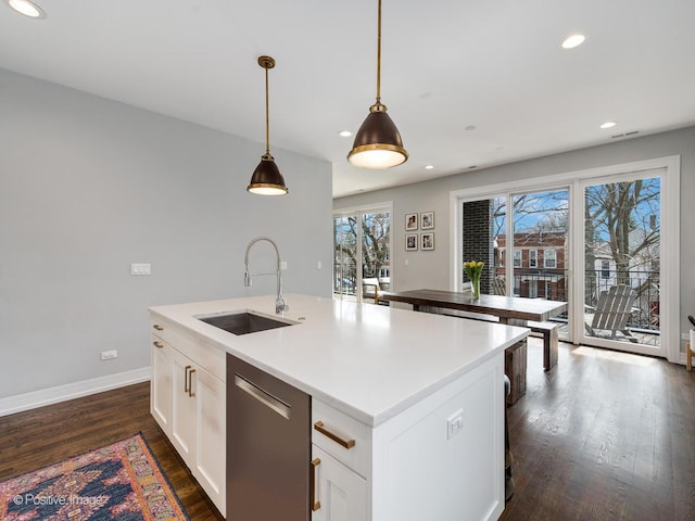 2422 W Lyndale St Unit 2, Chicago, IL 60647 - kitchen featuring a sink, stainless steel dishwasher, dark wood-style floors, a kitchen island with sink, and recessed lighting