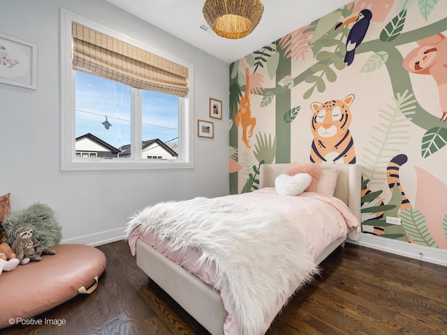 2422 W Lyndale St Unit 2, Chicago, IL 60647 - bedroom with baseboards and wood finished floors