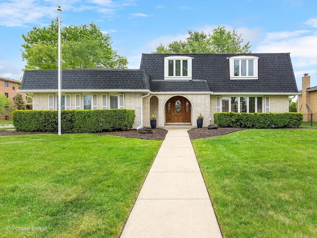 7514 Nantucket Dr, Darien, IL 60561 - front facade with roof with shingles, brick siding, and a front lawn