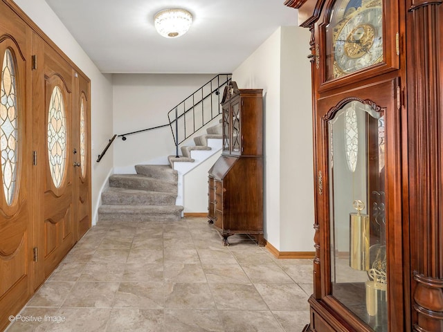 7514 Nantucket Dr, Darien, IL 60561 - entryway with stairway and baseboards