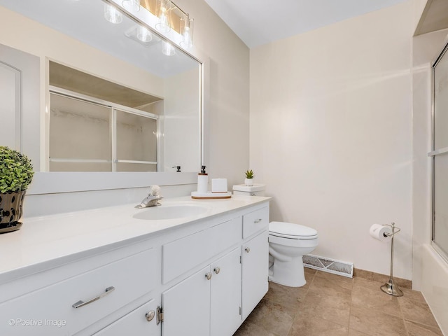 7514 Nantucket Dr, Darien, IL 60561 - full bath with a shower with shower door, vanity, toilet, and baseboards