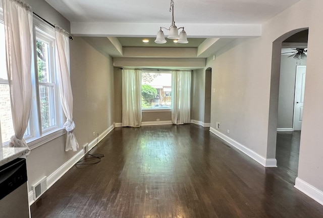 8920 S Jeffery Blvd, Chicago, IL 60617 - unfurnished dining area with arched walkways, healthy amount of natural light, and dark wood-style flooring